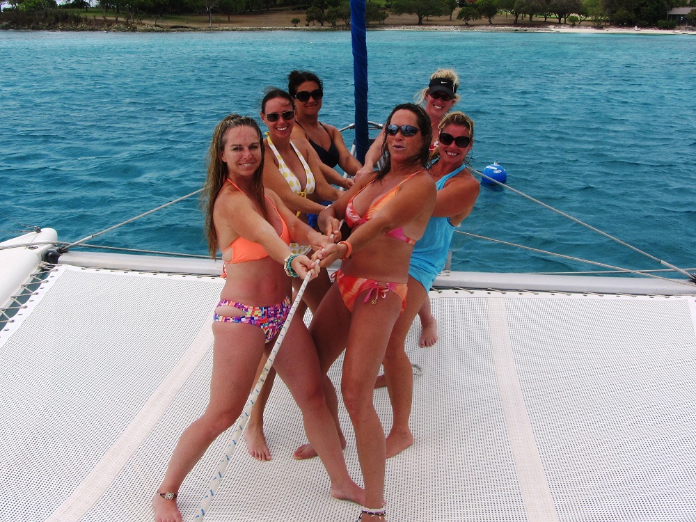 Ladies helping handle the boat