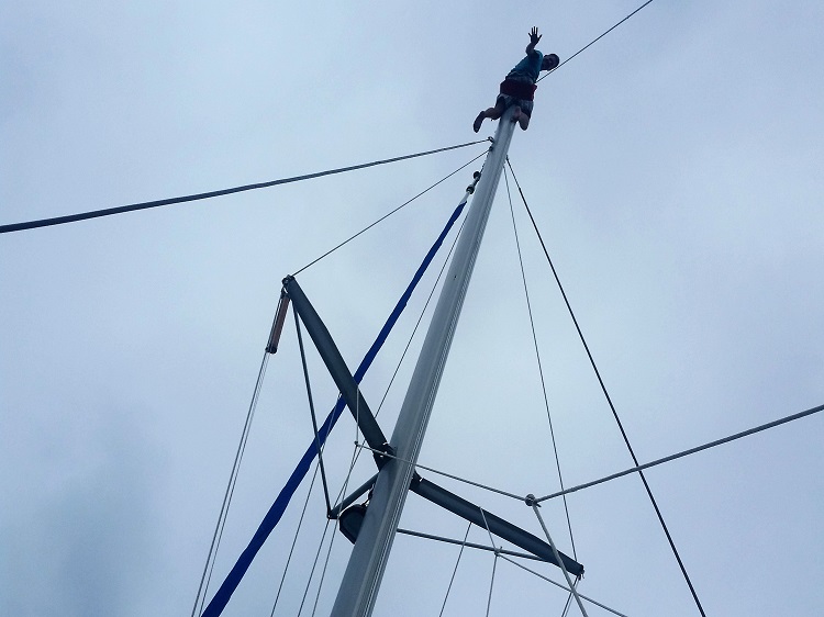 Another trip up the mast, this time to replace a light